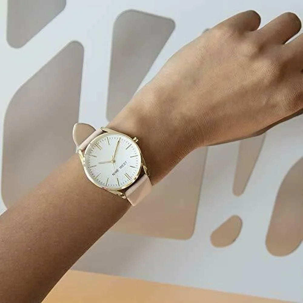 Nine West Women's Gold-Tone and Pastel Pink Strap /1994WTPK Watch