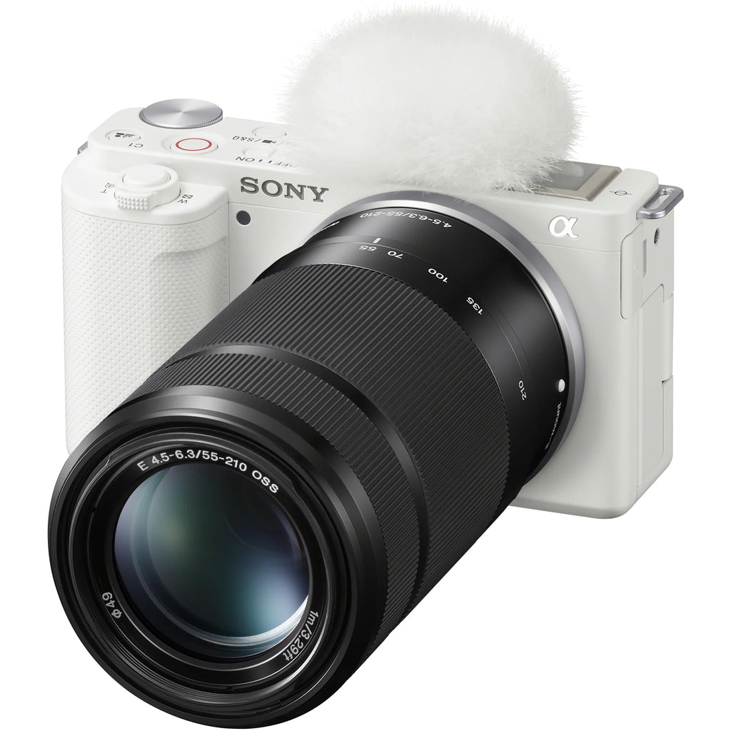 Sony -E10 Mirrorless Alpha -C Vlog Camera 2 Lens Kit 16-50mm + 55-210mm -E10L/W White Bundle with Deco Gear Case + Filter Set + Wide Angle & Telephoto Lenses + Extra Battery & Accessories